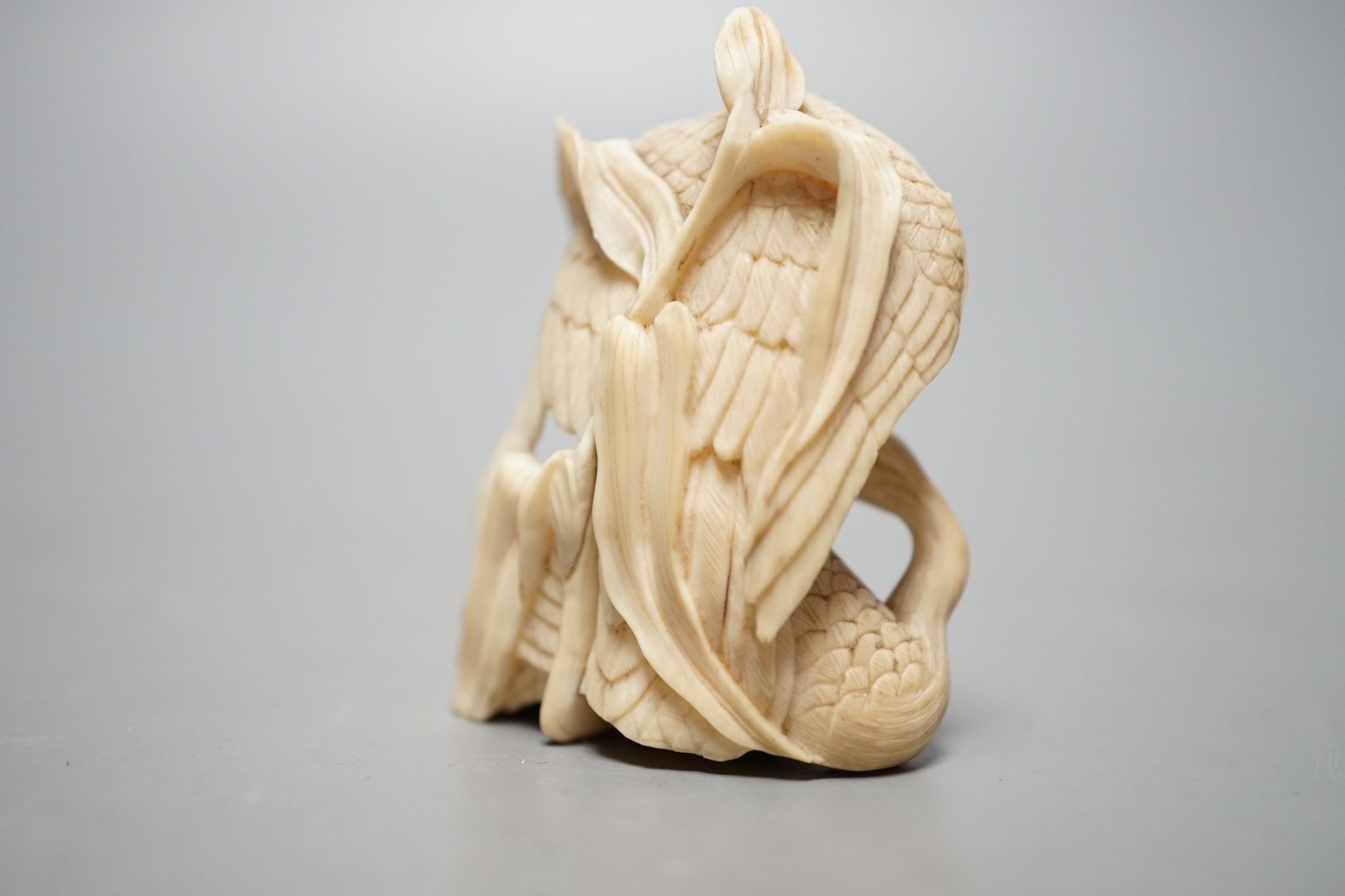 A Japanese ivory eagle and goose okimono, 5.5cm